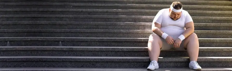 Man sitting alone on stairs